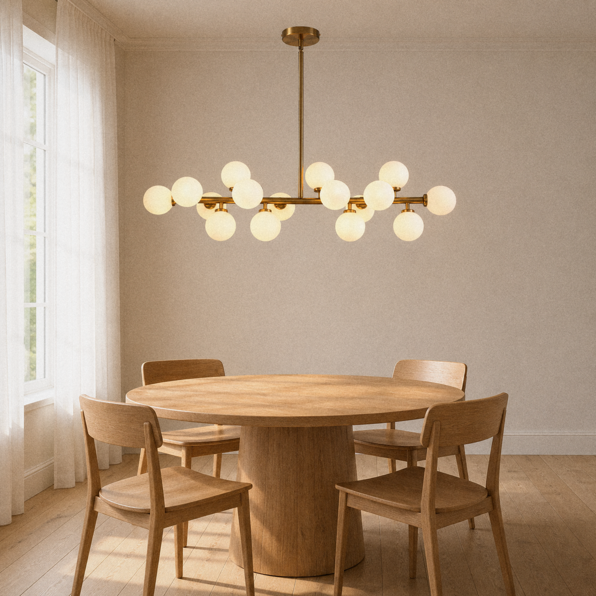 In a room | marnau Glazenn 16-light sputnik chandelier in brushed brass hung above a round wood dining table with four chairs, beside a sheer-curtained window