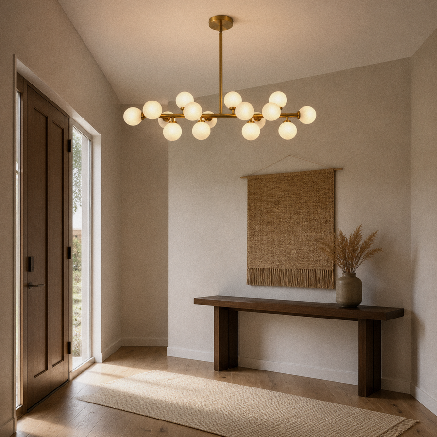 In a room | marnau Glazenn 16-light sputnik chandelier hung in an entryway with a dark wood front door, jute wall hanging, console table, and jute runner rug