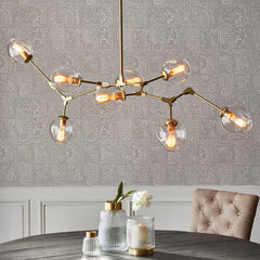 Globe Chandelier with 8 Lights in Antique Brass and Clear Glass