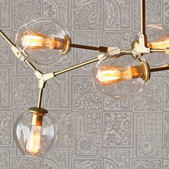 Globe Chandelier with 8 Lights in Antique Brass and Clear Glass
