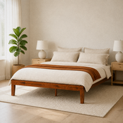 Airy corner | Three-quarter bedroom view with the platform bed, window light, rug, and nightstands