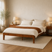Angle | Three-quarter bedroom view showing the open base, square legs, and broad wood rails