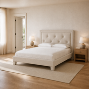 Scale | Light beige tufted bed beside a full-height doorway