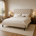 Room angle | Light beige tufted bed from the front-left in the limestone bedroom