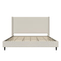 Studio frame front | Textured ivory canvas wingback bed showing the footboard, slats and two black legs