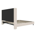 Studio rear | Textured ivory canvas wingback bed showing the upholstered wing posts and support frame