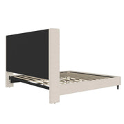 Studio rear | Textured ivory canvas wingback bed showing the upholstered wing posts and support frame