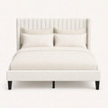 Studio front | Ivory linen-blend bed with tall channel-tufted wingback headboard