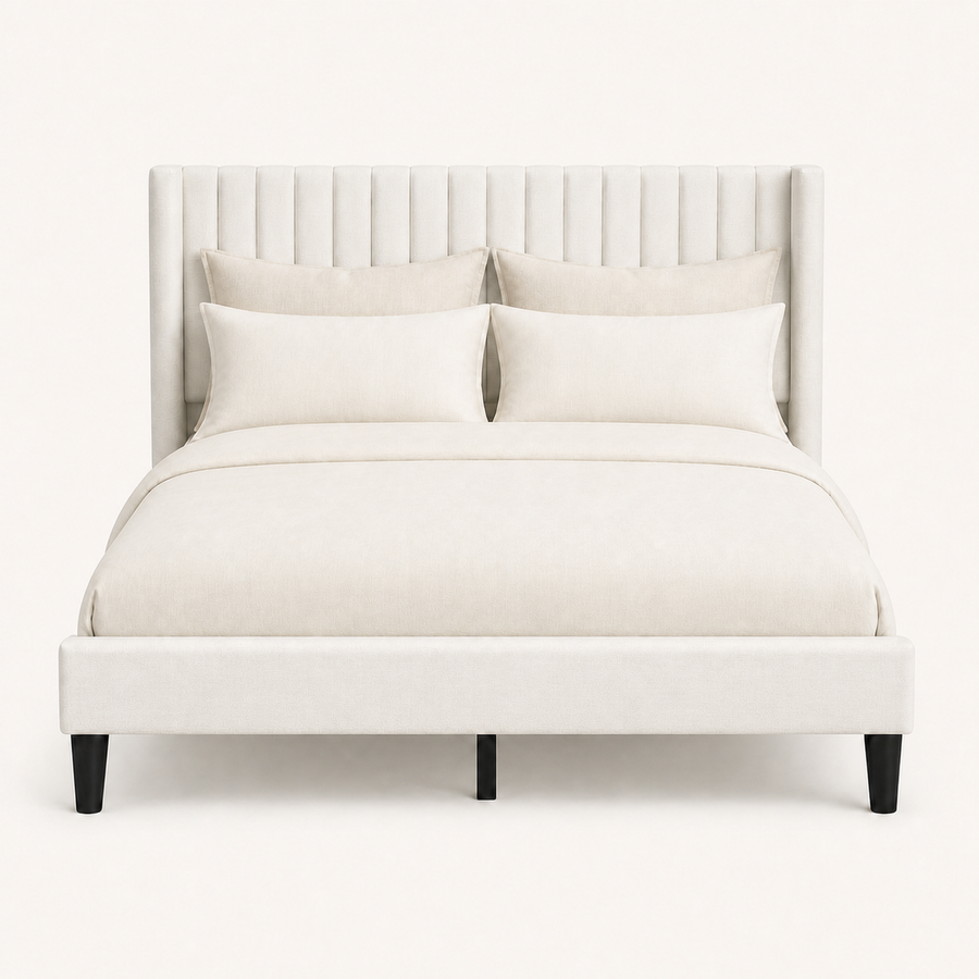 Studio front | Ivory linen-blend bed with tall channel-tufted wingback headboard