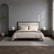 Blue-gray bedroom | Walnut and light linen platform bed with dark nightstands