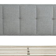 Headboard and slats | Light Gray vertical-channel headboard above the exposed wood slat system