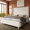 Terracotta bedroom | Three-quarter view of the Cream tufted wingback bed with an olive patterned rug and cream relief art
