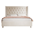 Studio front | Untouched straight-on view of the Cream tufted wingback bed