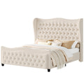 Studio view | Cream velvet wingback bed in a full three-quarter view on a plain white background