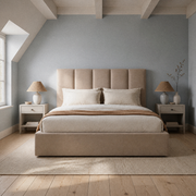 Room 3 | Front view of the beige five-channel upholstered bed in a blue-gray beamed bedroom