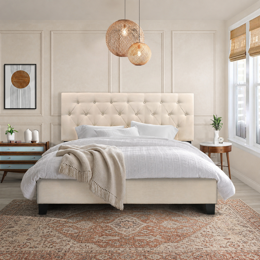 Room | Beige tufted upholstered bed in a warm ivory panelled bedroom