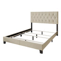 Studio | Beige upholstered bed frame in three-quarter view