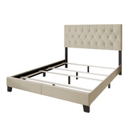 Studio | Beige upholstered bed frame in three-quarter view