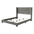 Studio frame | Light Gray tufted wingback bed showing support rails