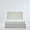 Studio front | Straight-on view of the ivory canvas wingback bed