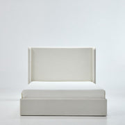 Studio front | Straight-on view of the ivory canvas wingback bed