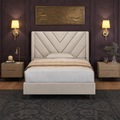 Aubergine bedroom | Beige velvet chevron-tufted wingback bed centered against dark plaster walls with brass relief art