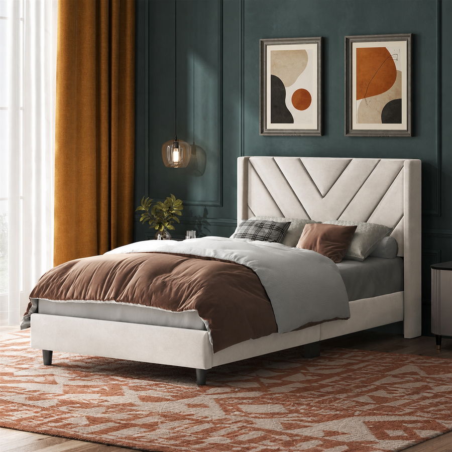 Teal bedroom angle | Beige velvet chevron-tufted wingback bed beside ochre curtains and a rust patterned rug