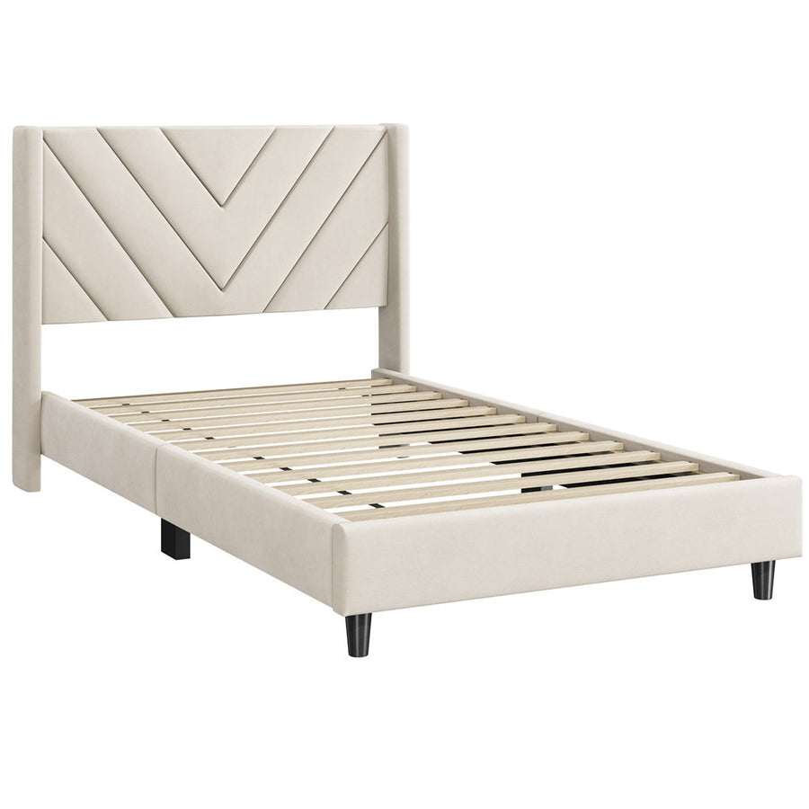 Studio three-quarter | Untouched Beige velvet chevron-tufted wingback bed frame on seamless white