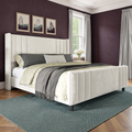 Aubergine bedroom | Cream velvet channel tufted bed with pearl gray curtains and a teal rug