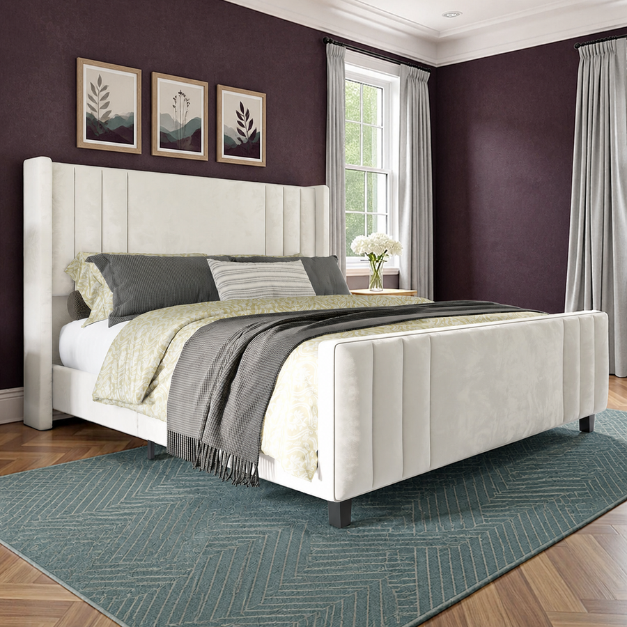 Aubergine bedroom | Cream velvet channel tufted bed with pearl gray curtains and a teal rug