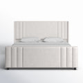 Studio front | Straight-on cream velvet channel tufted bed on a white seamless background