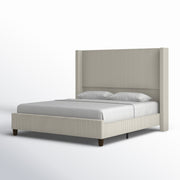 Studio angle | Right three-quarter view of Cream corduroy wingback platform bed