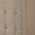 Nailhead detail | Double rows of silver nailheads along the beige linen wing