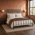 Clay angle | Corner view showing the open metal frame, wall sconces, and dark wood floor