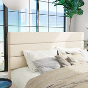 Headboard detail | Three horizontal cream upholstered panels with smooth padding