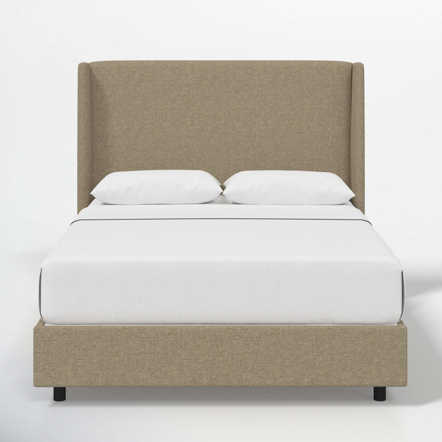 Studio front | Natural textured linen wingback bed with a continuous headboard and low footboard