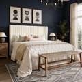 Navy bedroom angle | cream velvet channel wingback bed with oatmeal curtains
