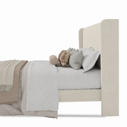 Wing detail | cream velvet wingback and upholstered side rail from the side