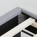 Rail detail | Upholstered rail corner, metal bracket, and wood slat support