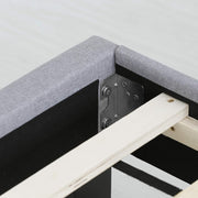 Rail detail | Upholstered rail corner, metal bracket, and wood slat support