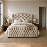 In scale | cream velvet wingback bed beside a fully visible interior doorway