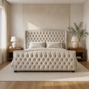 Warm ivory bedroom | cream velvet tufted wingback bed with walnut nightstands