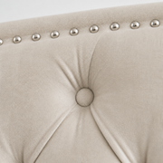 Velvet detail | cream velvet with diamond tufting and silver nailhead trim