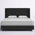 Studio front | Black velvet wingback bed with white bedding