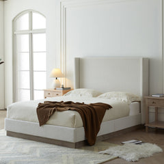 Angle | Three-quarter view of the Grevane Whalsay Upholstered Wingback Bed