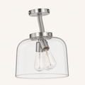 Studio angle | three-quarter studio view of the canopy, rod arms, and glass bell