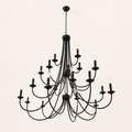 Underside | low studio view of the black three-tier chandelier showing the chain, canopy, and separated arm levels