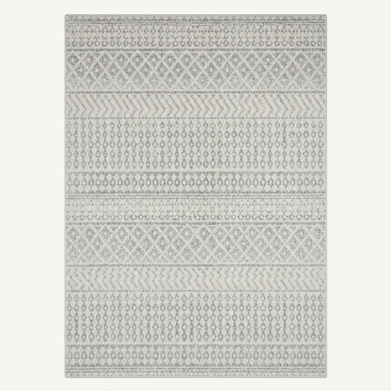 Flat lay | the rug laid fully flat, light gray, gray, and white geometric pattern