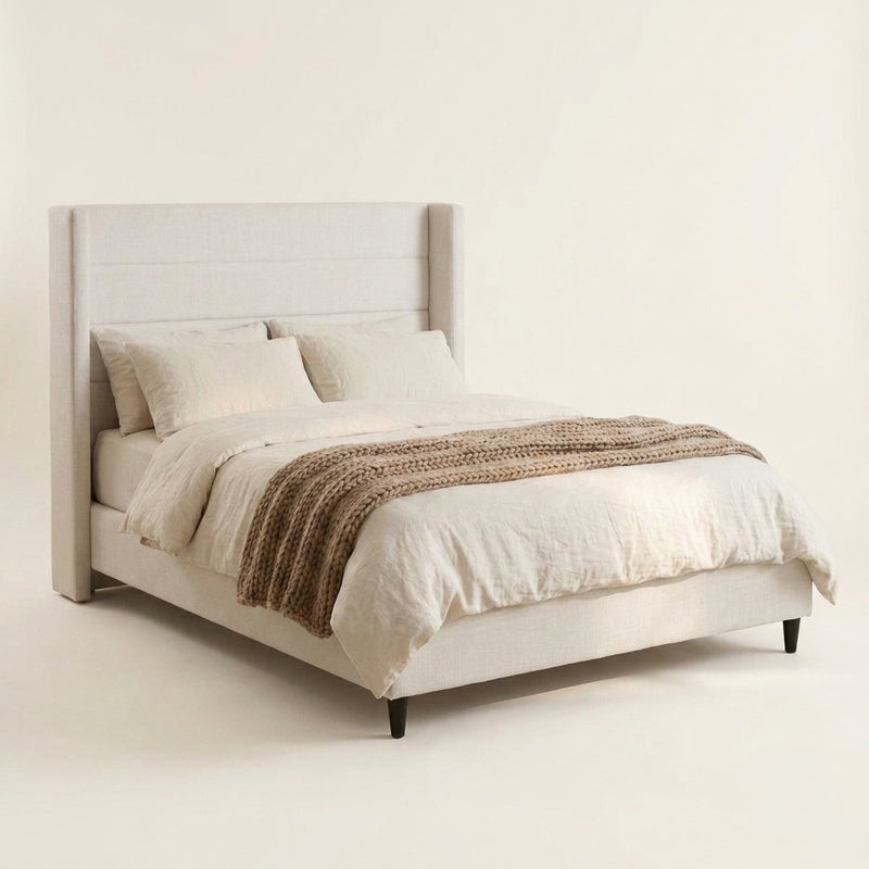 Grevane Haven Upholstered Wingback Bed - angled studio view