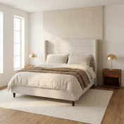 Grevane Haven Upholstered Wingback Bed - three-quarter view